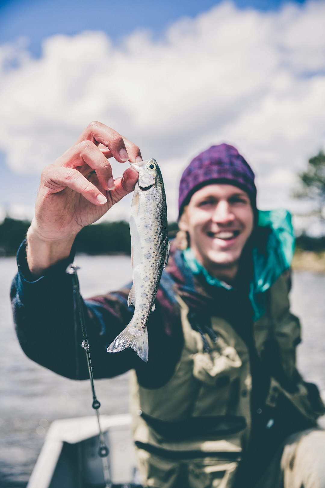 depth-photography-of-man-holding-fish-veobb3p5yoi